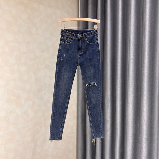 European ripped jeans women's spring 2023 new slimming elastic high waist nine-point pencil pants