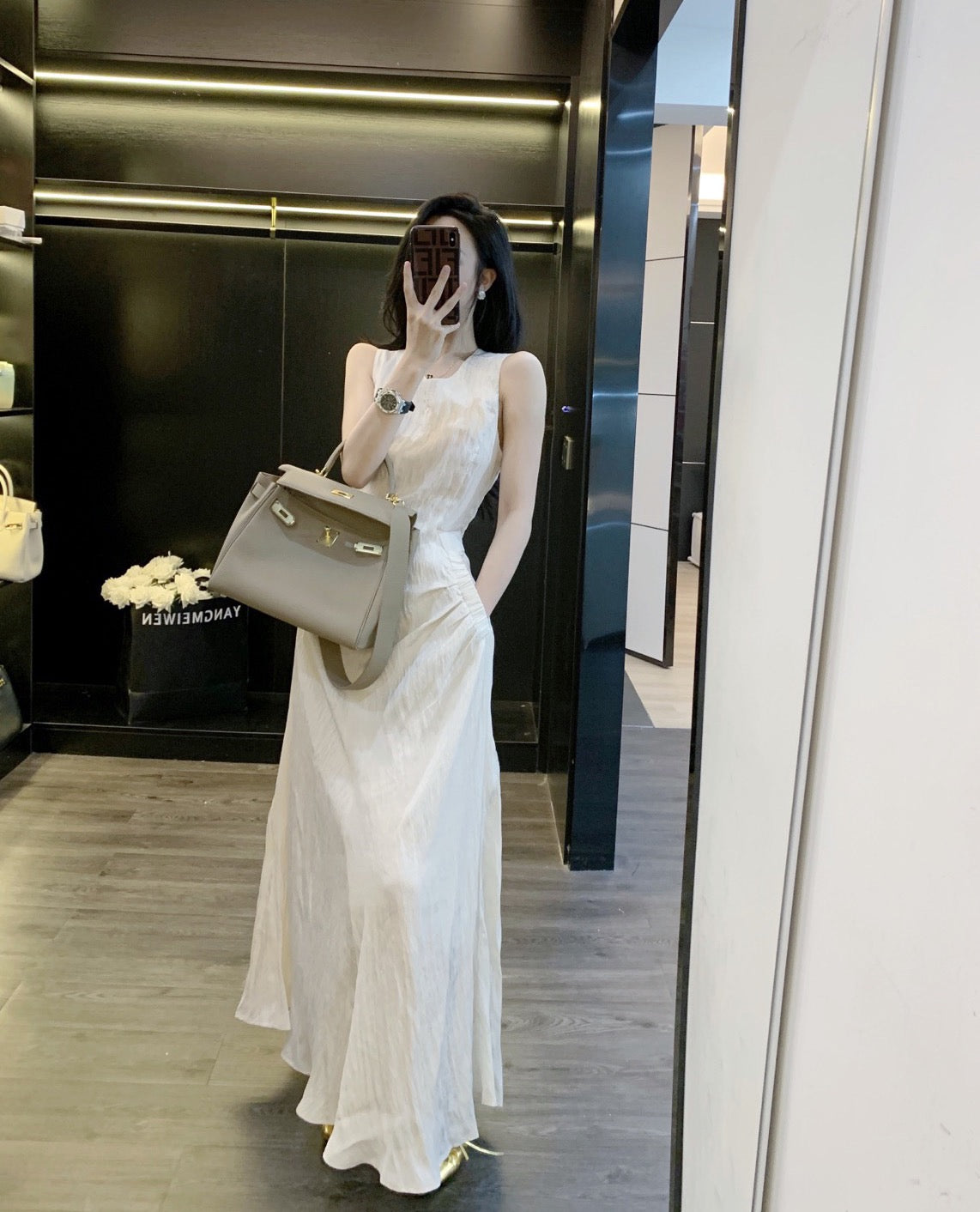 Leathercat suspender dress summer new women's 2023 high-end sense of self-cultivation bag hip slim temperament long skirt