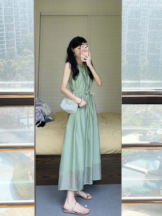 French hanging neck strap dress women's summer seaside vacation green sleeveless vest long skirt high-end sense waist slimming