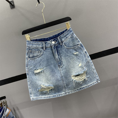 European ripped denim skirt female 2023 summer foreign style high waist slimming A-line anti-light package hip short skirt