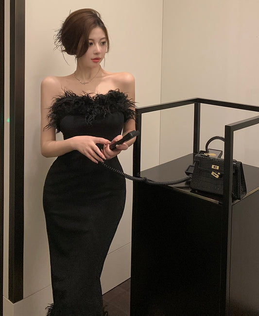Dress women's Korean version of the slim sexy package hip long skirt spring fashion design tube top hairy black skirt trendy