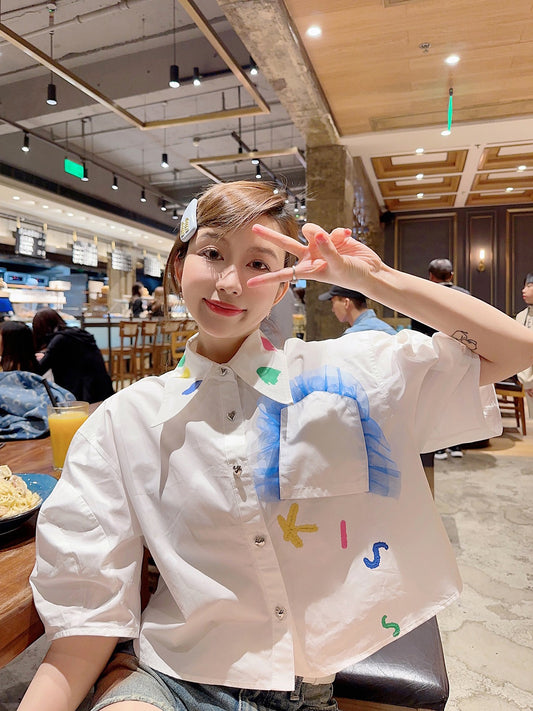 Thebestxue Korean college style lace pocket letter graffiti short navel white shirt female summer tide