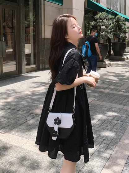 Tea break French puff sleeve black dress female summer 2023 new loose casual fashion age-reducing doll skirt