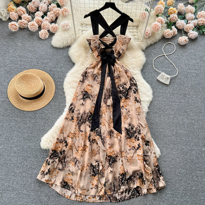 French romantic retro atmosphere floral suspender dress female hollow tie waist waist temperament super fairy holiday dress