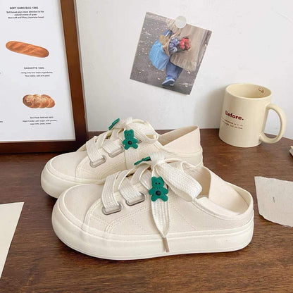 Japanese two-wear canvas shoes women's spring and summer new chic niche design thin section round toe students slip on small white shoes