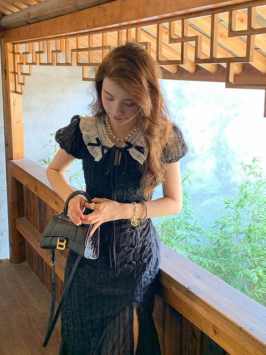 Deng Liuliu improved version of cheongsam temperament mermaid skirt sexy leaky waist hit color doll collar black dress female summer