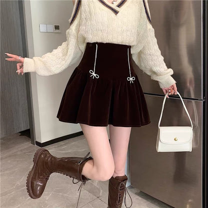 Skirt women's autumn and winter 2022 new Korean version design sense niche high waist thin temperament a-line pleated short skirt