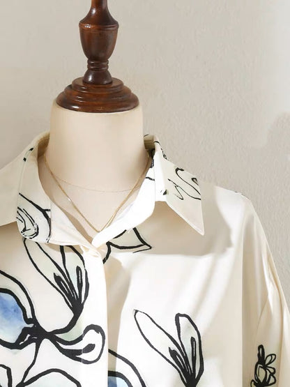 Niche design sense printed lapel shirt women 2023 spring women's temperament professional commuting lantern sleeve shirt