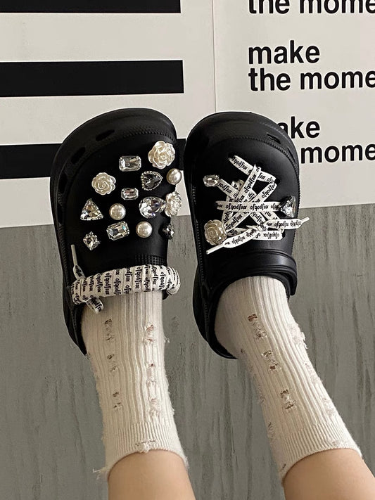 Thick-soled Baotou slippers for women to wear in autumn 2022, the new style of stepping on shit, super-fire rhinestones, going out non-slip hole shoes