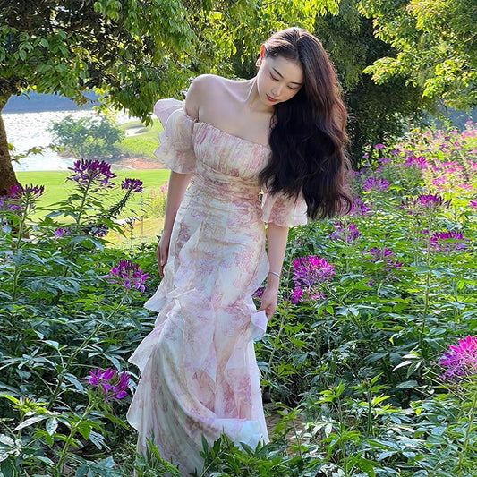 Xiaoli Peter Pan one-shoulder puff sleeve chiffon floral suspender dress 2022 summer niche design long skirt