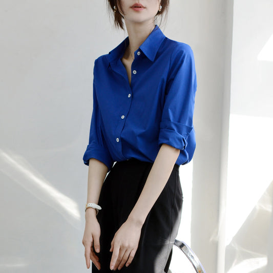 TRR tucked into pants looks great Sapphire blue long-sleeved loose shirt single-breasted lapel shirt top chic
