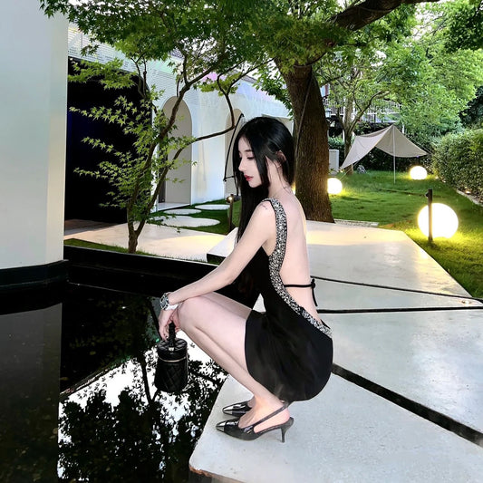 Black sexy backless diamond suspender dress women's summer high-end sense banquet light luxury dress skirt hot girl little black dress