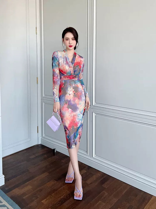 European station smudged dress autumn 2022 new women's French temperament V-neck slim slimming one-step skirt 1543