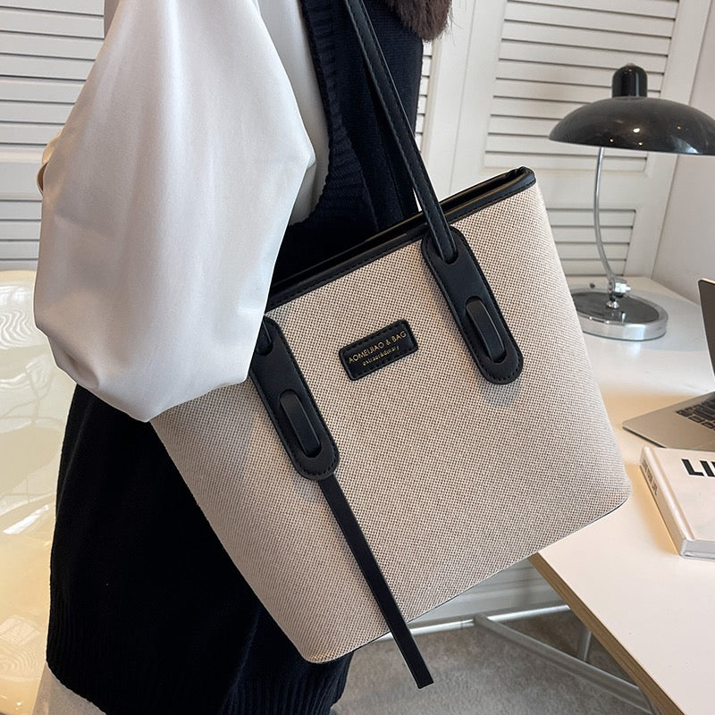 Large-capacity bag women's bag 2023 new high-end canvas shoulder bag portable bucket cloth bag commuting tote bag