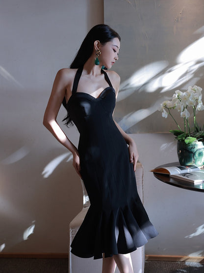 Xiaoli swaying wind chimes black sling bag hip dress autumn and winter 2022 with French advanced sexy mermaid skirt