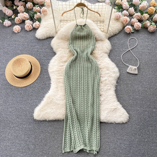 Niche design high-end socialite temperament hanging neck sleeveless hollow knitted dress female slim slit holiday skirt