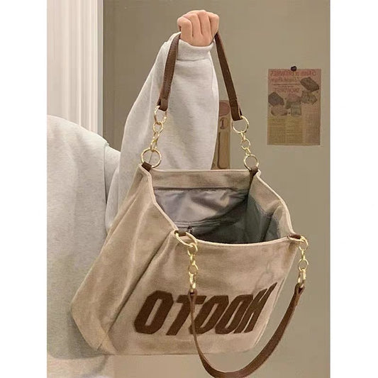 College students attend class one shoulder canvas bag large bag female large capacity 2022 new summer high-level sense commuter tote bag