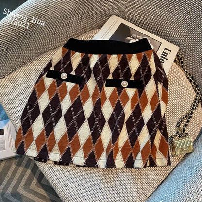 Design sense niche small fragrant style knitted suit women's spring 2023 new retro foreign style skirt two-piece suit