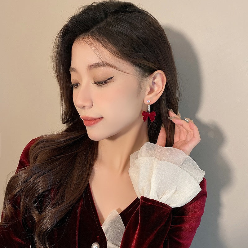 Silver needle autumn and winter red velvet earrings female pearl bow earrings niche design high-end versatile earrings