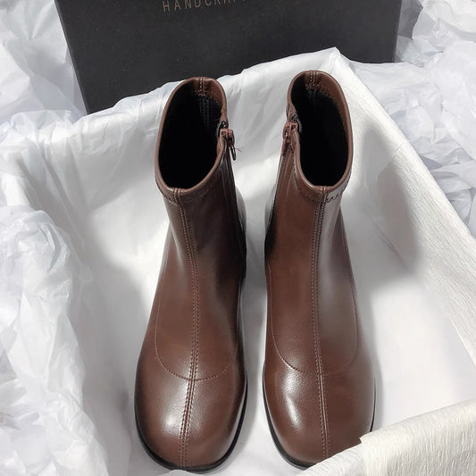 Senyu Haixiang Super cute and cute leather flat bottom elastic thin round head side zipper fashion simple commuter short boots