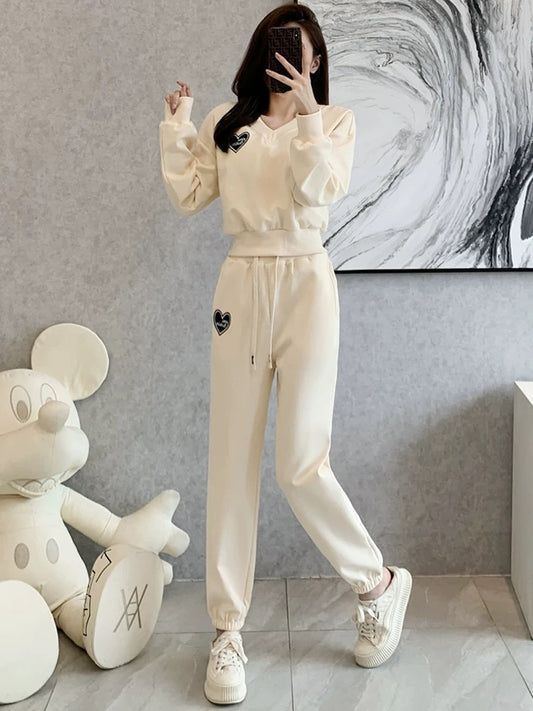 Sports and leisure suits women's autumn 2022 new salt series fashion Western style reduction V-neck slim sweater running two-piece set