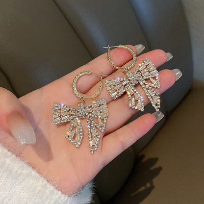 Super fairy earrings high-end sense light luxury 2021 new trendy small earrings exquisite bow earrings exaggerated earrings