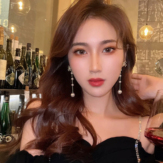 High-quality bow pearl earrings for women 2021 new niche design earrings ear clips silver needle cold wind earrings