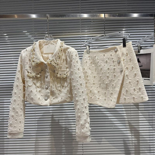 Internet celebrity with the same style 2022 winter new style small fragrance style high-definition pearl beaded short jacket + beveled skirt suit