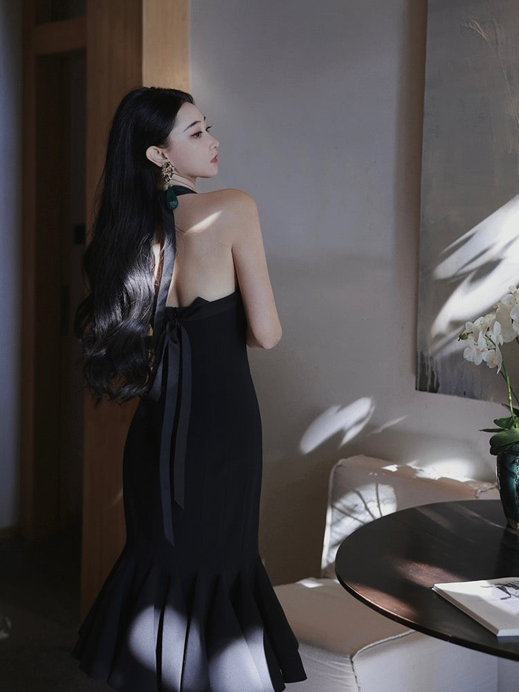 Xiaoli swaying wind chimes black sling bag hip dress autumn and winter 2022 with French advanced sexy mermaid skirt