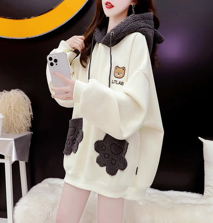 Fleece and thickened hooded sweater women's 2022 new autumn and winter hot style fashion western style age-reducing loose design coat
