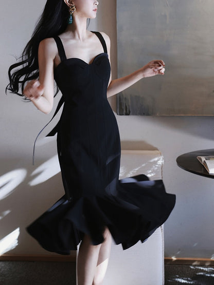 Xiaoli swaying wind chimes black sling bag hip dress autumn and winter 2022 with French advanced sexy mermaid skirt