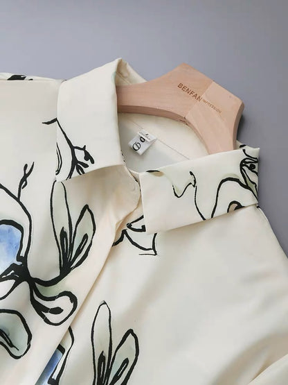 Niche design sense printed lapel shirt women 2023 spring women's temperament professional commuting lantern sleeve shirt
