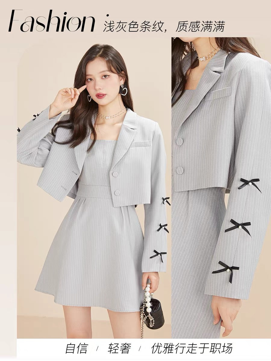 Fantu 2022 autumn new style bow decoration fashion suit women's short long-sleeved zipper suspender skirt two-piece set