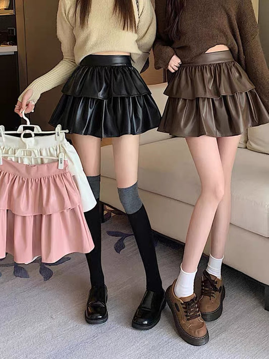 A-line skirt female autumn and winter with sweater 2022 new cake fluffy skirt high waist small leather skirt
