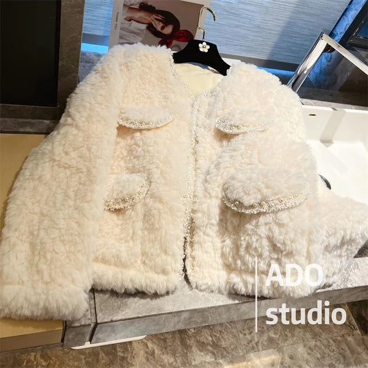 Lamb wool coat women's fur all-in-one top 2022 autumn and winter new small fragrance style ladies temperament high-end long sleeves