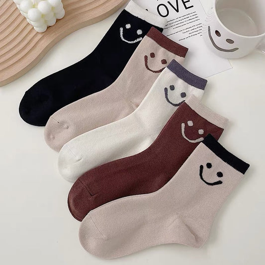 Winter socks women's smiley face in the tube socks thickened Korean version of the coffee color wild warm cute solid color simple wool stockings