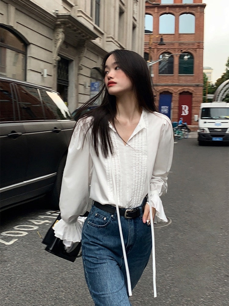 Pusumede white long-sleeved shirt female 2022 new trumpet sleeve top niche French chic lace-up shirt