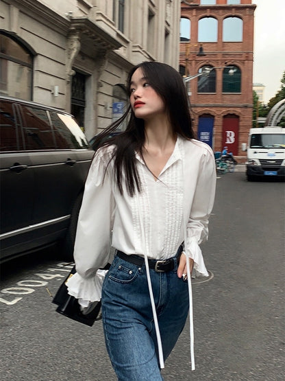 Pusumede white long-sleeved shirt female 2022 new trumpet sleeve top niche French chic lace-up shirt