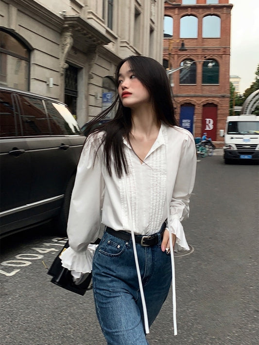 Pusumede white long-sleeved shirt female 2022 new trumpet sleeve top niche French chic lace-up shirt