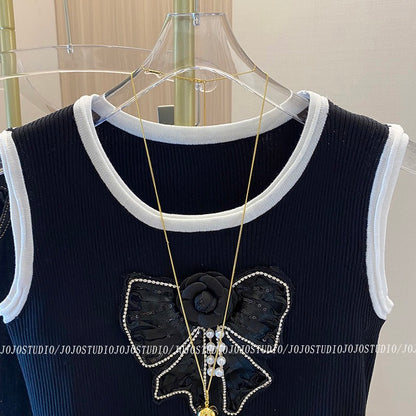 Xiaoxiangfeng Contrasting Color Bow Knot Diamond Flower Round Neck Vest Female 2022 Early Autumn New Black Short Top