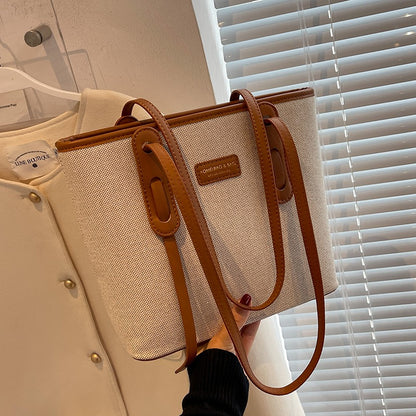 Large-capacity bag women's bag 2023 new high-end canvas shoulder bag portable bucket cloth bag commuting tote bag