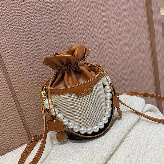 Explosive Western-style high-end small bucket bag women's summer 2022 new all-match niche design single-shoulder messenger bag