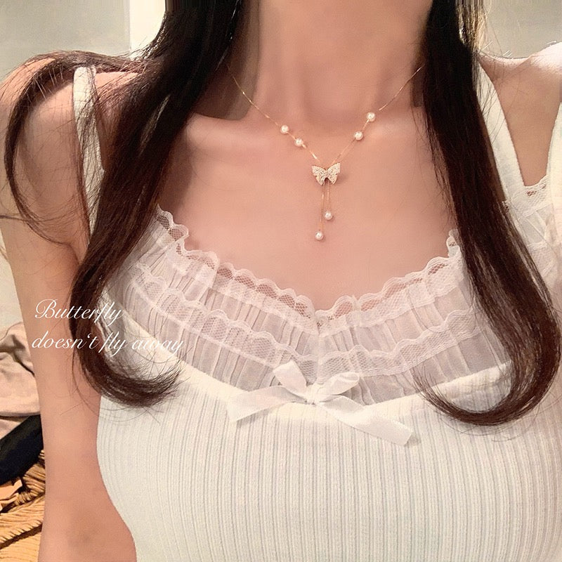 Pure desire butterfly pull pearl necklace women's spring light luxury niche high-end design sense necklace clavicle chain accessories