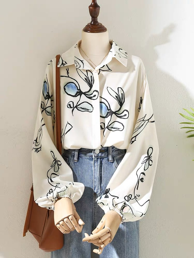 Niche design sense printed lapel shirt women 2023 spring women's temperament professional commuting lantern sleeve shirt