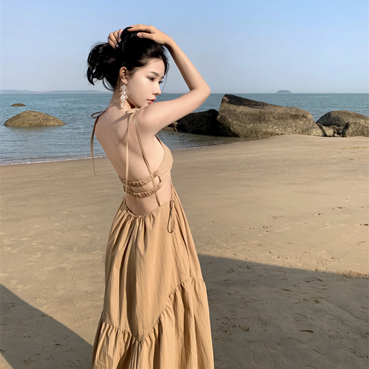 Design sense niche backless dress female summer beach suspender skirt Xishuangbanna seaside holiday big swing long skirt