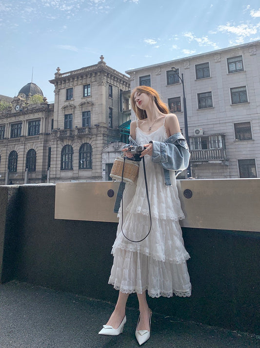 Guoguojia white dress female summer 2023 new cake skirt seaside vacation beach skirt suspender skirt