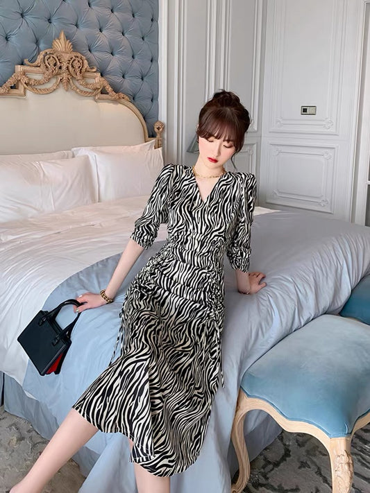 European station retro trend design sense niche dress feminine V-neck slim drawstring zebra print long skirt