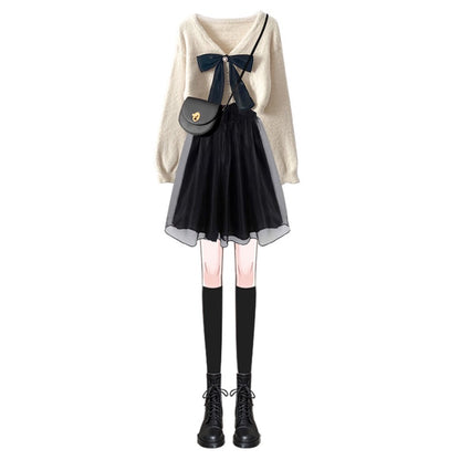 French high-end suspender dress looks thin 2023 new female chic sweet and spicy bow cardigan early autumn suit