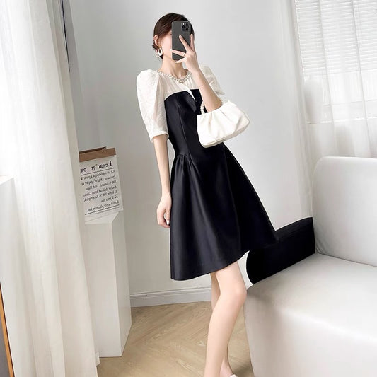 2022 new women's summer solid color stitching design puff sleeve dress women waist slim temperament A-line skirt
