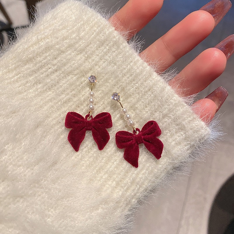 Silver needle autumn and winter red velvet earrings female pearl bow earrings niche design high-end versatile earrings